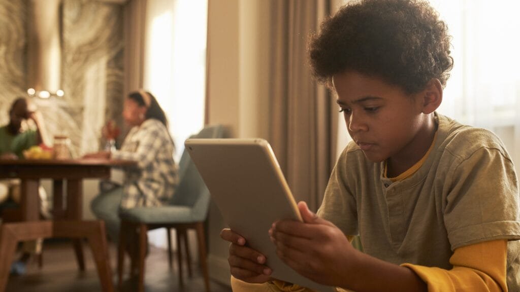 medium-shot-kid-holding-tablet